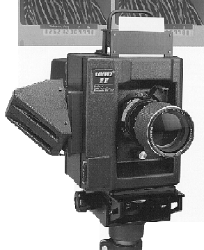Camerz Z-II school-portrait camera with a barcoded subject-ID card mounted on top — the studio workhorse EZ-SNAP integrated with for order capture